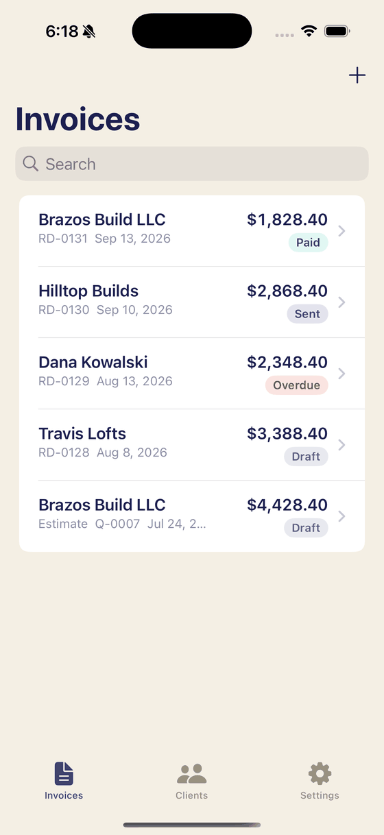 The invoice list in Bily: four American invoices in United States dollars, the paid one at the top.